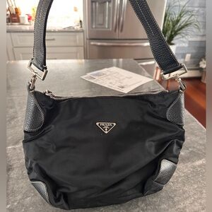 Prada, vintage satin and leather shoulder bag. Guaranteed authentic